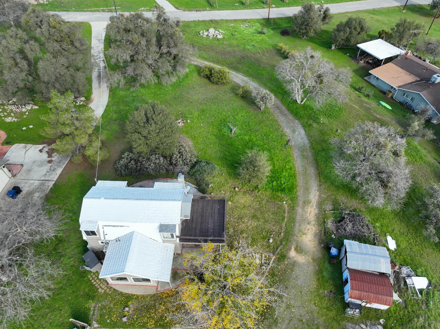 42560 Ranger Cir Way Coarsegold, CA 93614 - Photo 44 of 44 an aerial view of a house with outdoor space and street view
