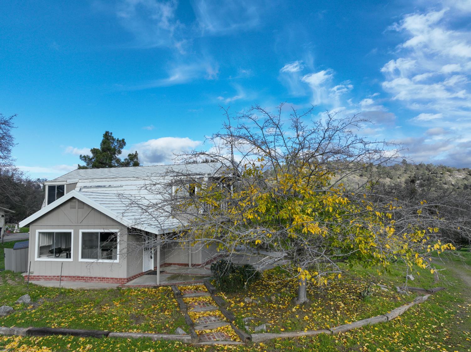 42560 Ranger Cir Way Coarsegold, CA 93614 - Photo 7 of 44 a view of a house with a yard
