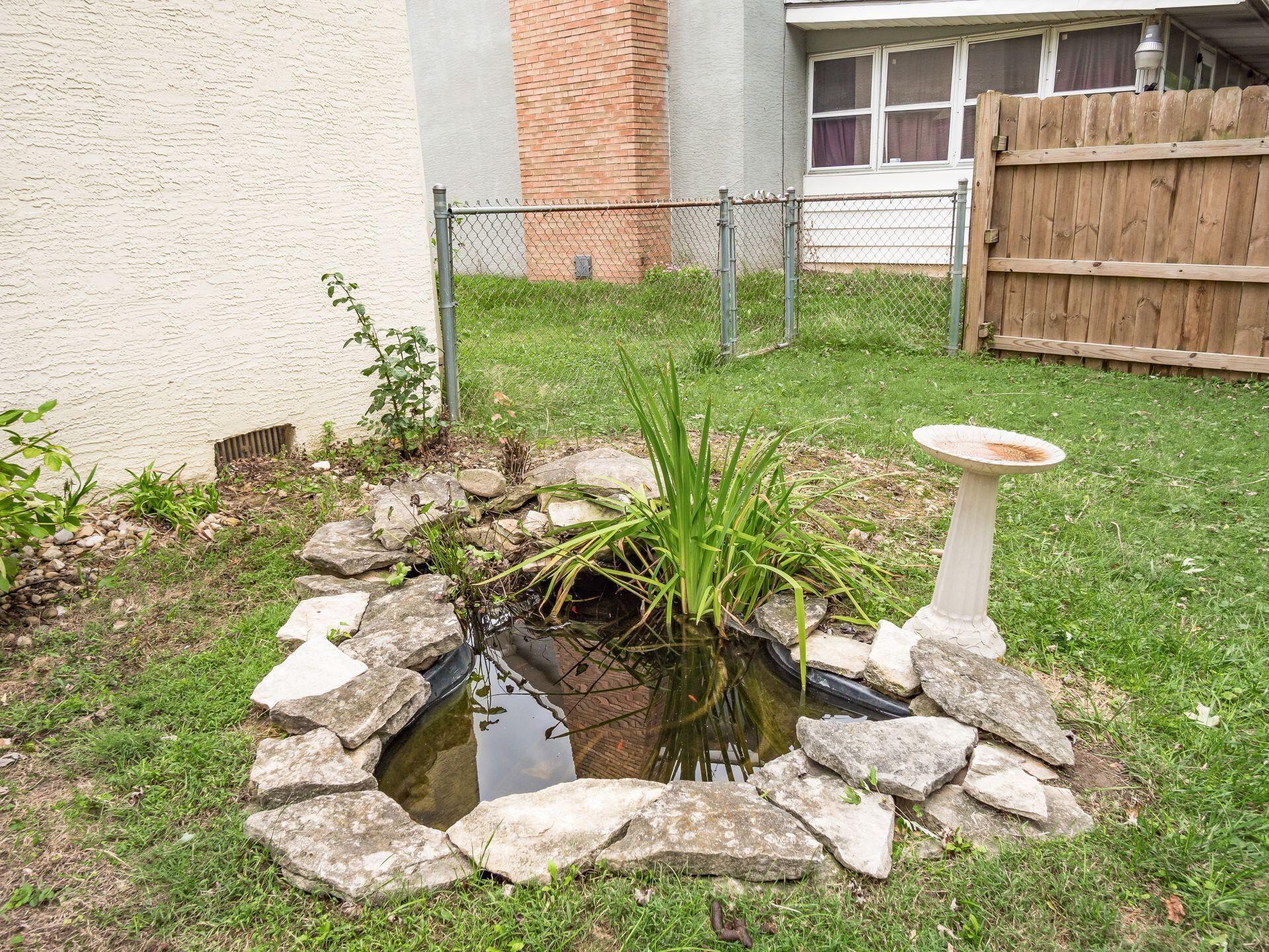 1891 Fairhaven Road Columbus, OH 43229 - Photo 32 of 36 Large fenced backyard with pond!