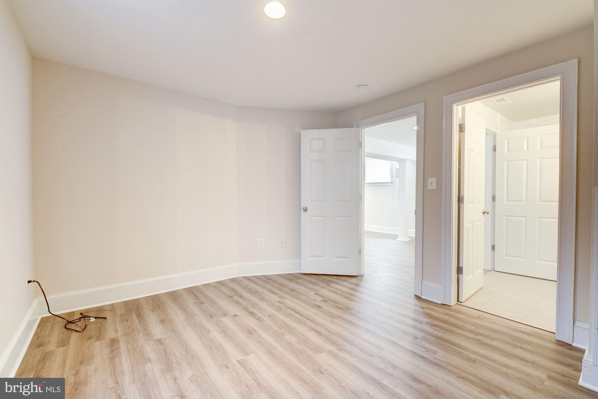 4416 Ridge Street Chevy Chase, MD 20815 - Photo 30 of 39 Basement bedroom
