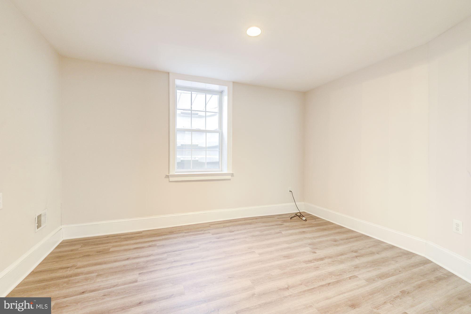 4416 Ridge Street Chevy Chase, MD 20815 - Photo 31 of 39 Basement bedroom