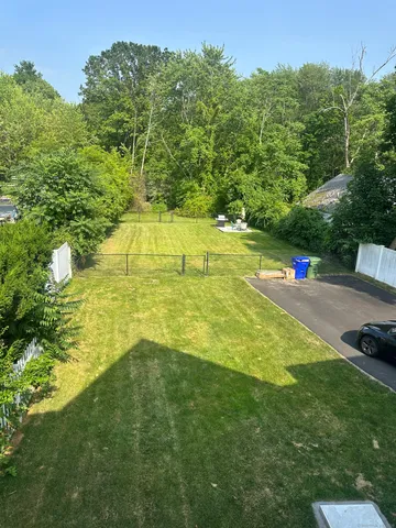 a view of an outdoor space and swimming pool