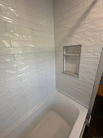 a bathroom with a bathtub