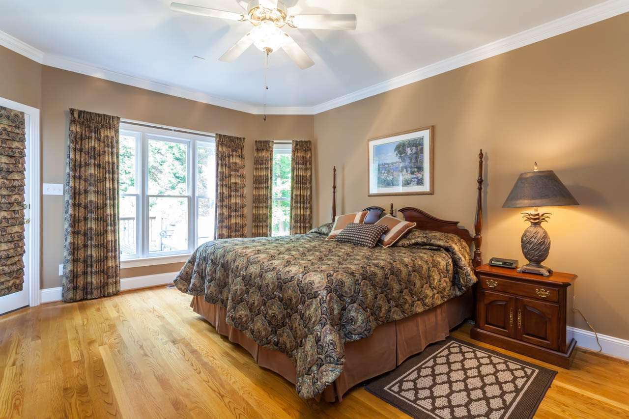13921 Possum Track Road Raleigh, NC 27614 - Photo 18 of 25 Magnificent Master Suite with Glowing Hardwoods and private Master Bath. Master Bedroom