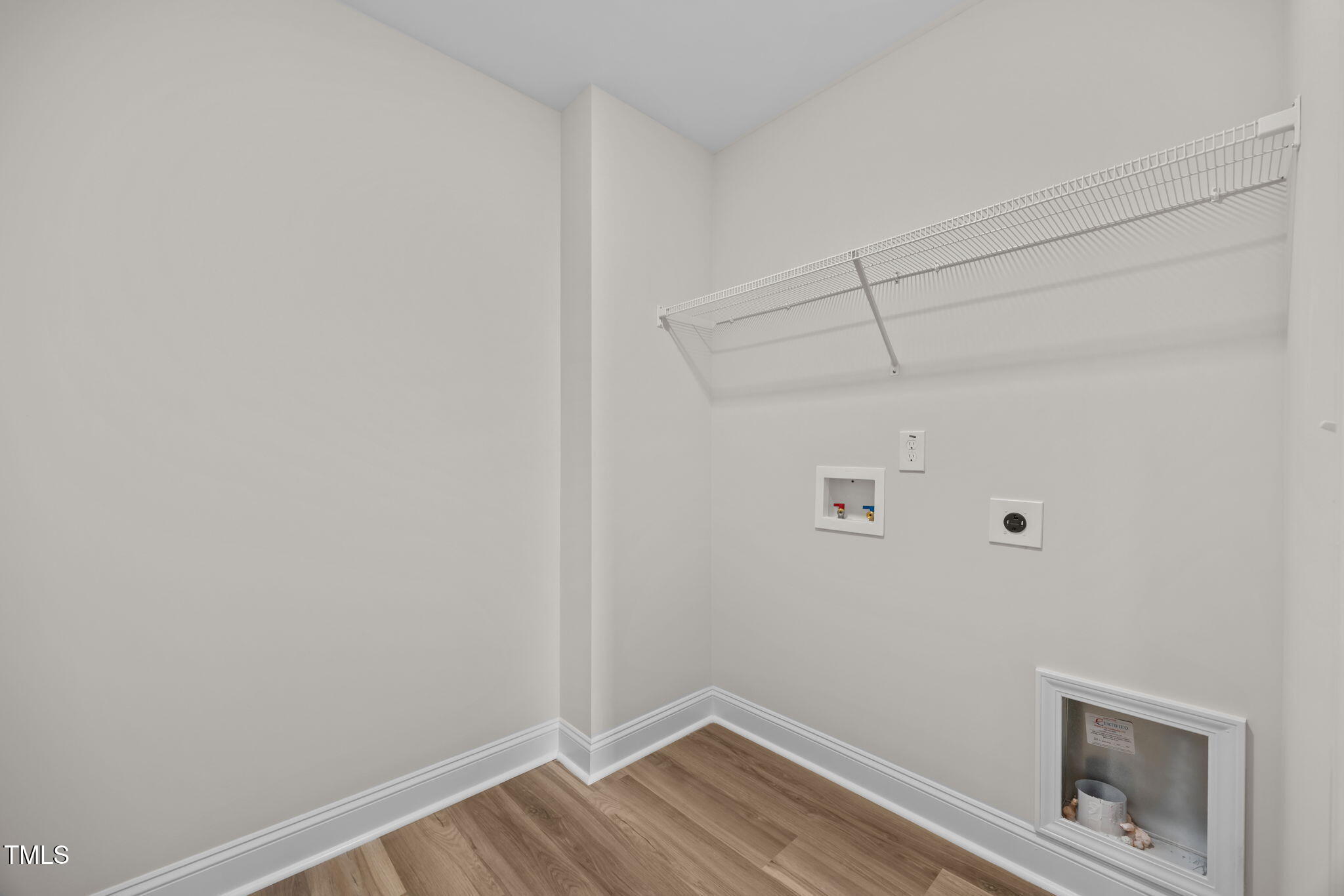 187 Regis Lane, Unit 10 Coats, NC 27521 - Photo 15 of 38 a view of a room with wooden floor