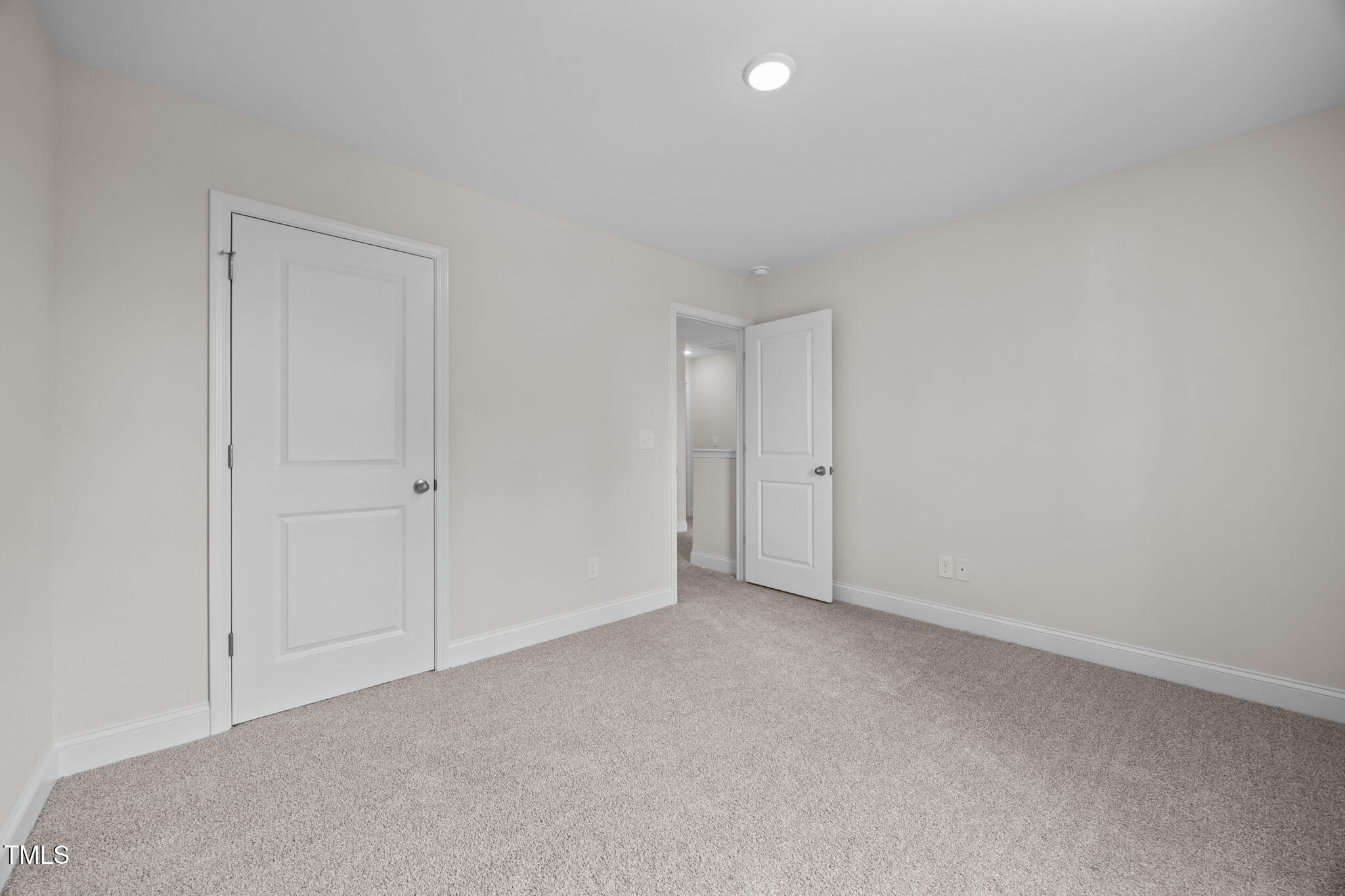 187 Regis Lane, Unit 10 Coats, NC 27521 - Photo 27 of 38 a view of an empty room
