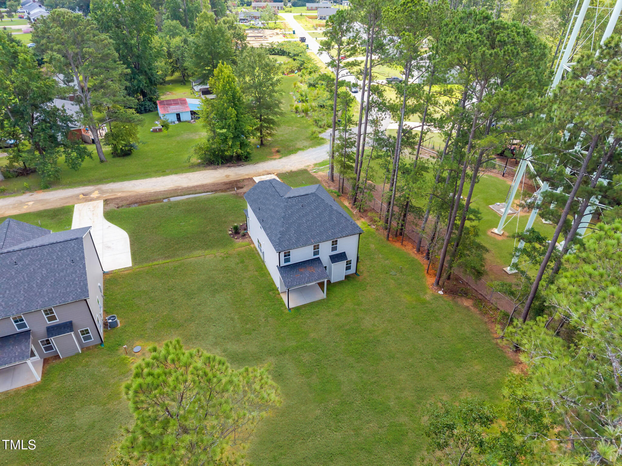187 Regis Lane, Unit 10 Coats, NC 27521 - Photo 34 of 38 8-web-or-mls-DJI_20250717124809_0922_D