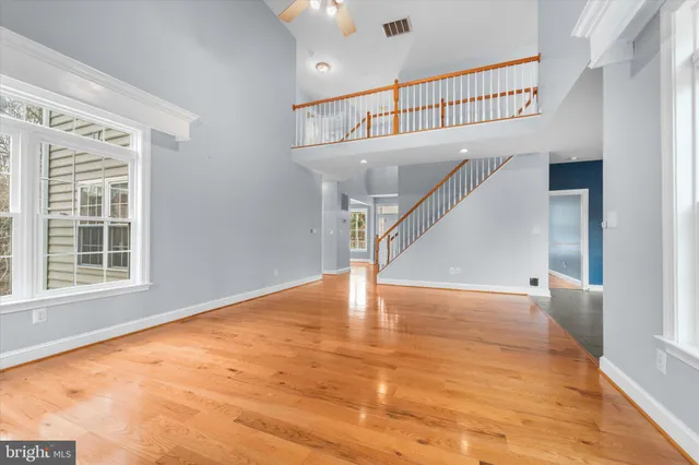 a view of room with wooden floor