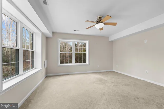 a view of an empty walk in closet