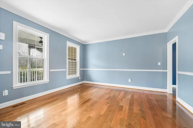 a view of a livingroom with wooden floor