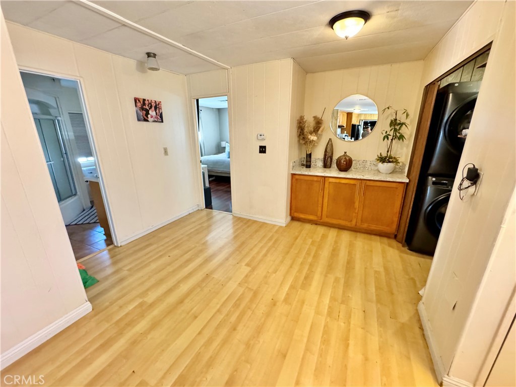 23301 Ridge Rte Drive, Unit 109 Laguna Hills, CA 92653 - Photo 37 of 46 a view of a living room with a wooden floor