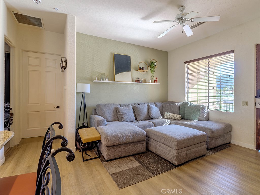 50680 Santa Rosa Plaza, Unit 8 La Quinta, CA 92253 - Photo 6 of 20 a bedroom with a bed furniture and a window