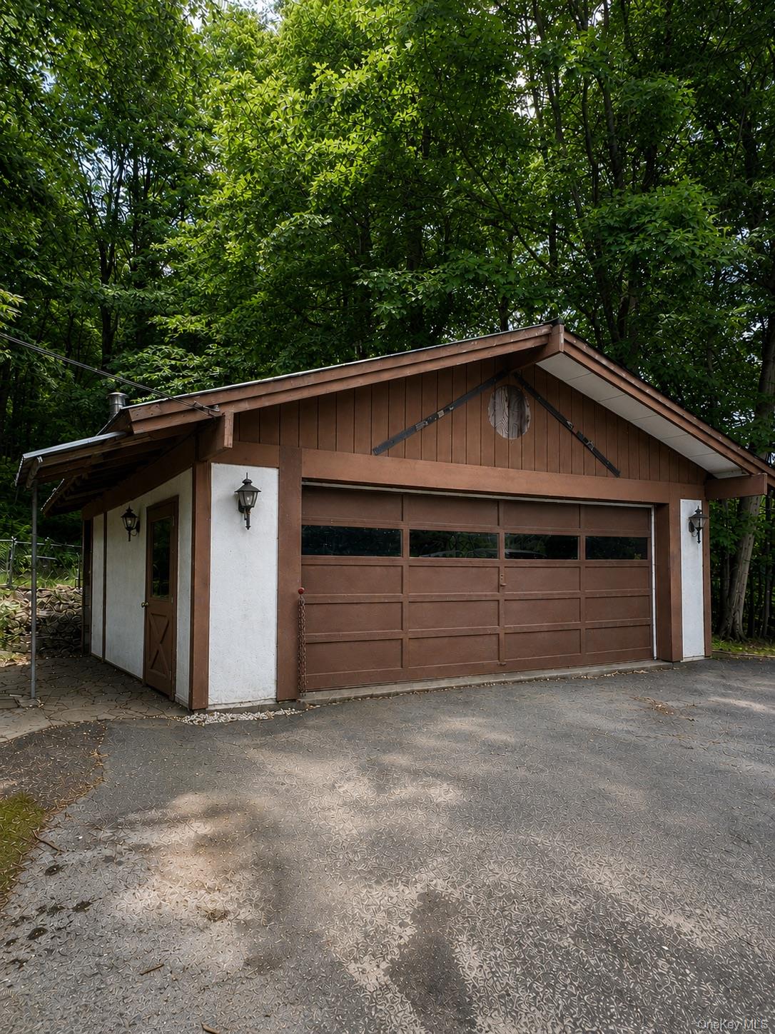 177 Davos Road Woodridge, NY 12789 - Photo 15 of 19 a view of a house with a garage