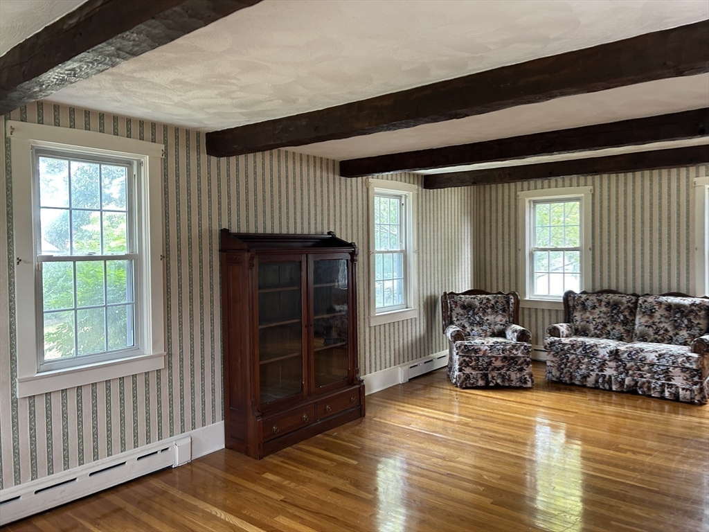 273 Main Street Acushnet, MA 02743 - Photo 11 of 37 a living room with furniture window and wooden floor