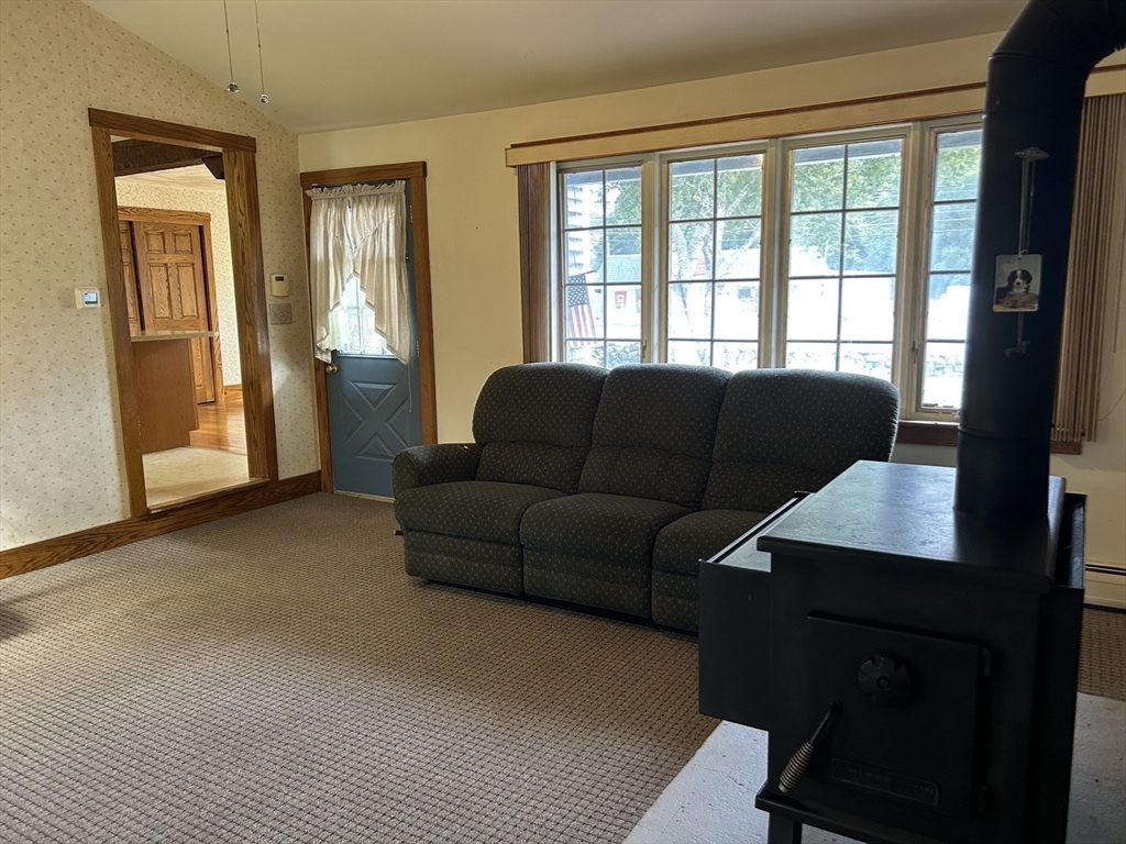 273 Main Street Acushnet, MA 02743 - Photo 19 of 37 a living room with furniture and a window