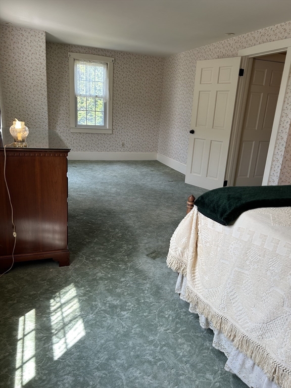 273 Main Street Acushnet, MA 02743 - Photo 26 of 37 a view of a closet area with bedroom