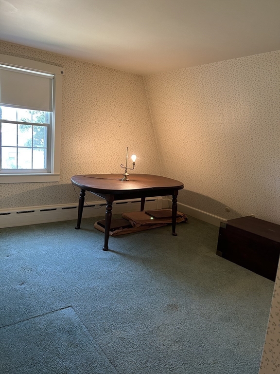 273 Main Street Acushnet, MA 02743 - Photo 29 of 37 a living room with furniture and a lamp