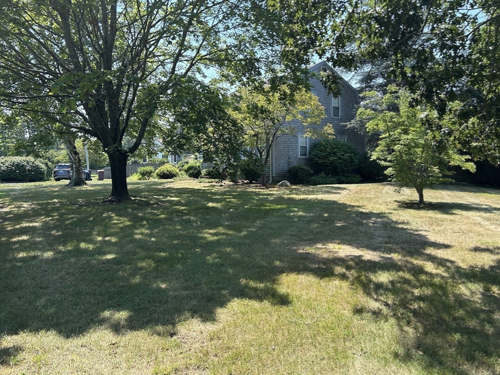 273 Main Street Acushnet, MA 02743 - Photo 31 of 37 a backyard of a house with lots of green space