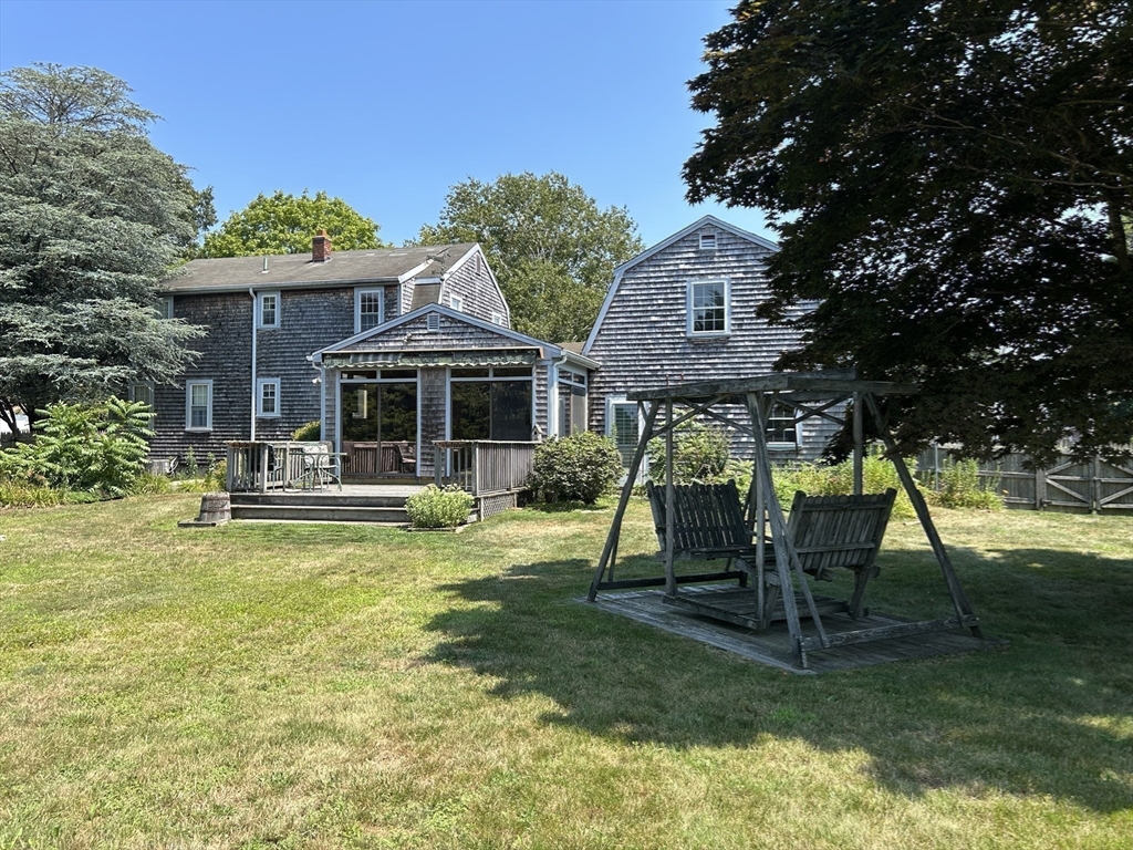 273 Main Street Acushnet, MA 02743 - Photo 36 of 37 a view of a house with a yard patio and deck