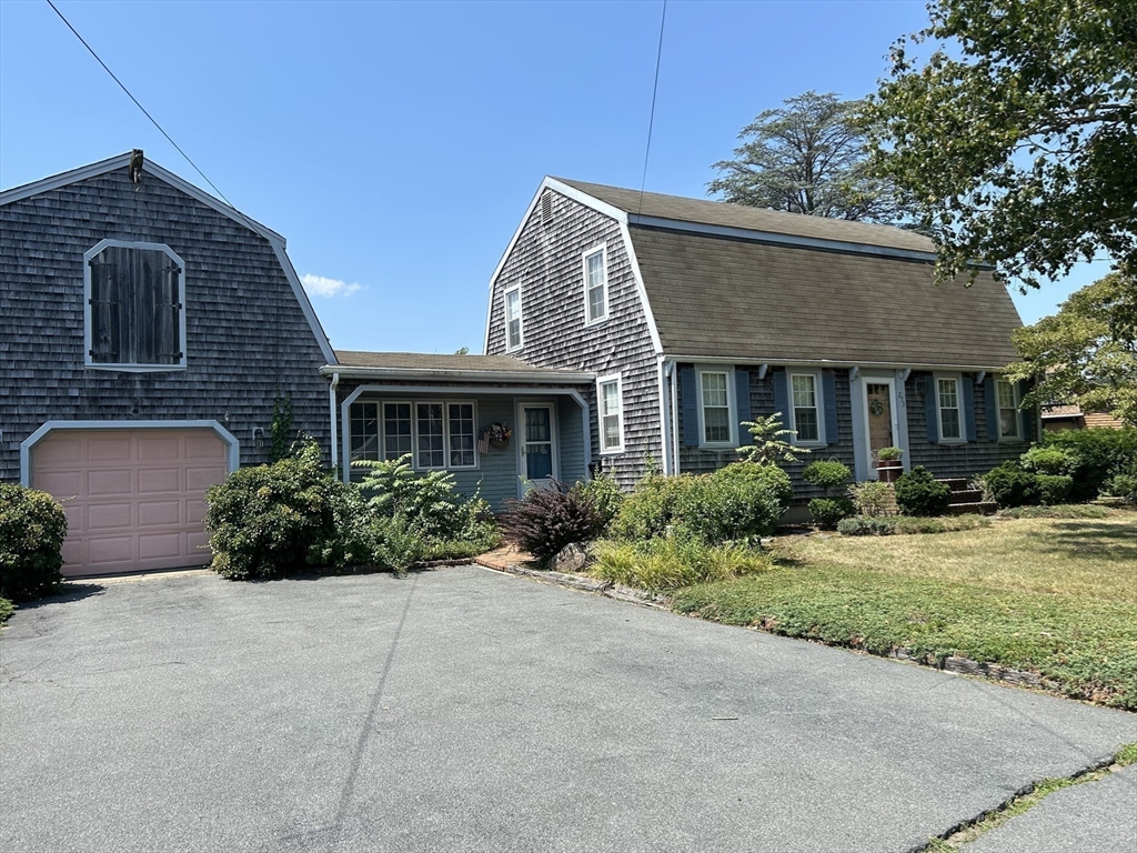 273 Main Street Acushnet, MA 02743 - Photo 4 of 37 a front view of a house with a yard