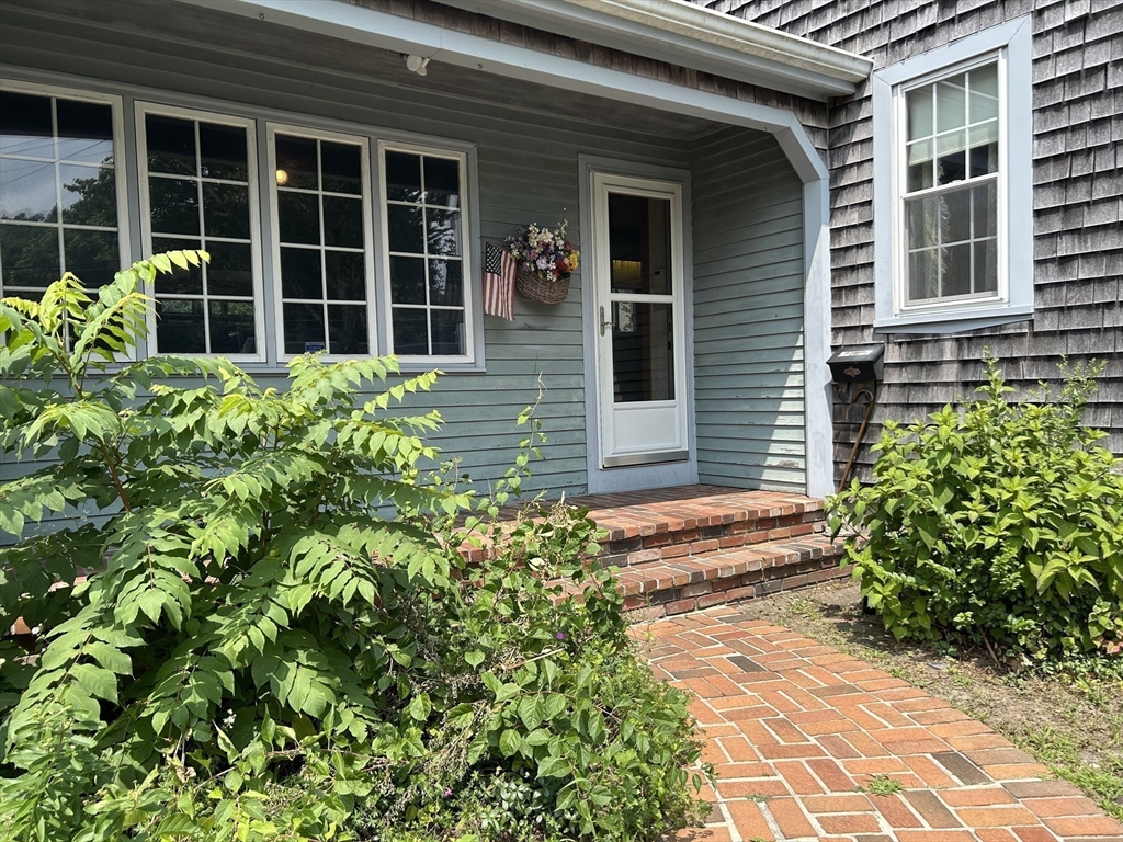 273 Main Street Acushnet, MA 02743 - Photo 7 of 37 a view of a house with potted plants