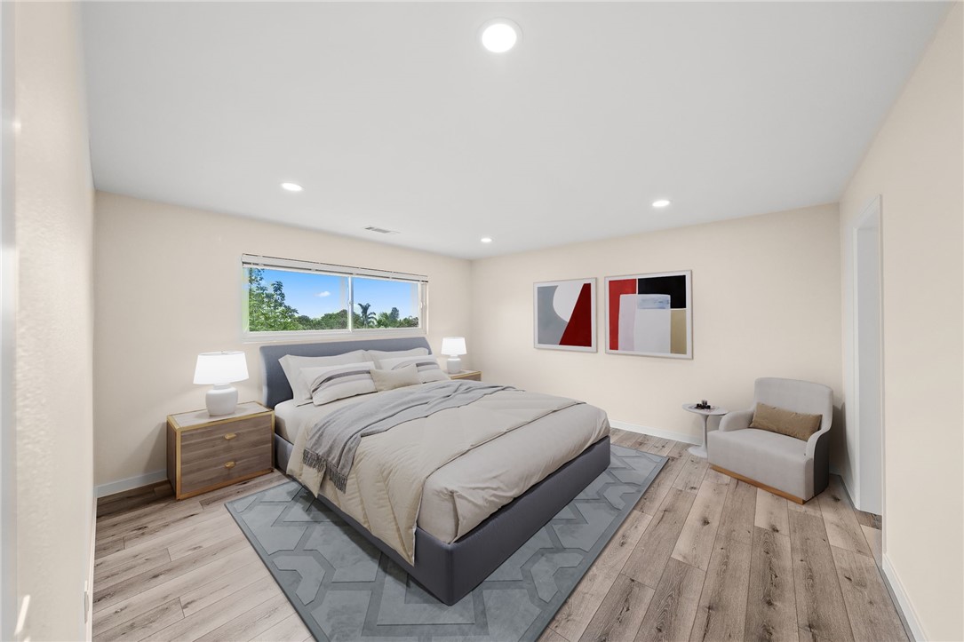 665 Norwynn Lane Fallbrook, CA 92028 - Photo 26 of 51 a bedroom with a bed and a couch