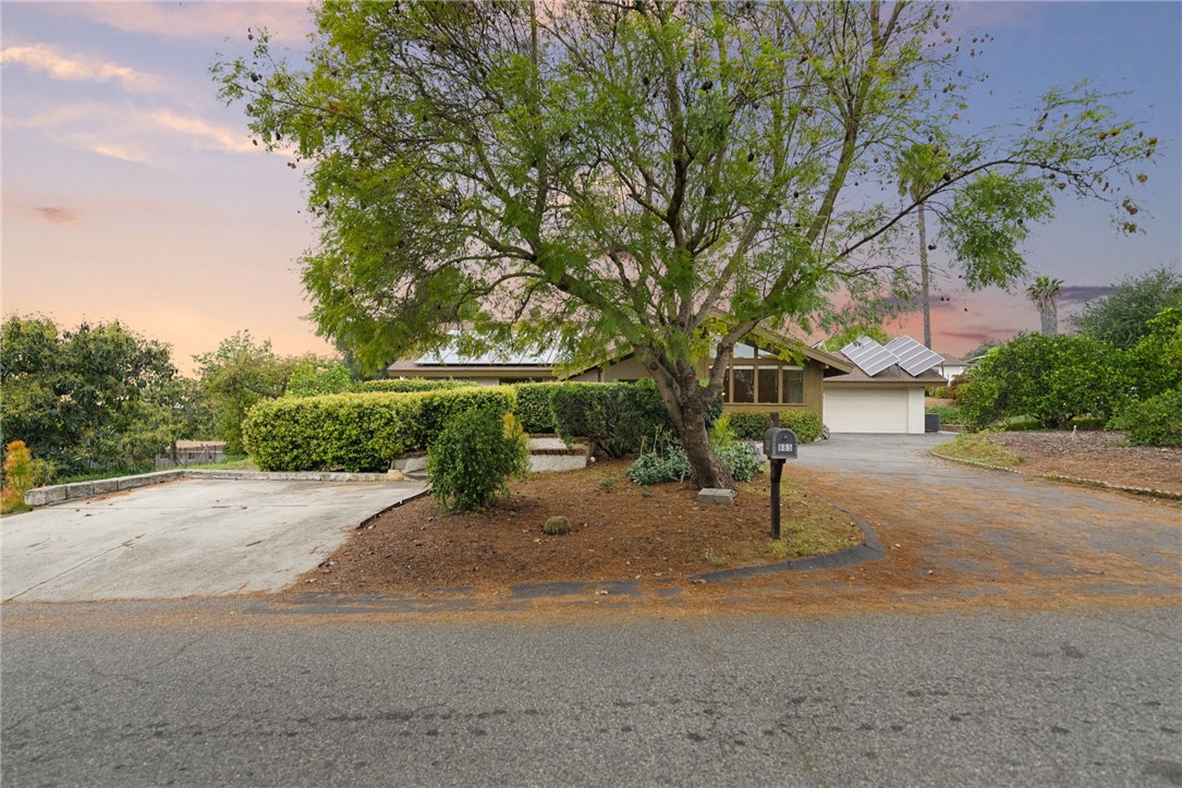 665 Norwynn Lane Fallbrook, CA 92028 - Photo 43 of 51 a view of a street with a house