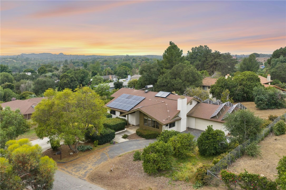 665 Norwynn Lane Fallbrook, CA 92028 - Photo 50 of 51 an aerial view of a house with pool and trees in the background