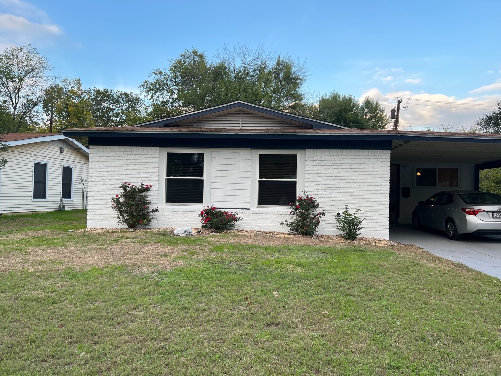 1318 Broadmoor Drive Austin, TX 78723 - Photo 1 of 1 a house view with a garden space