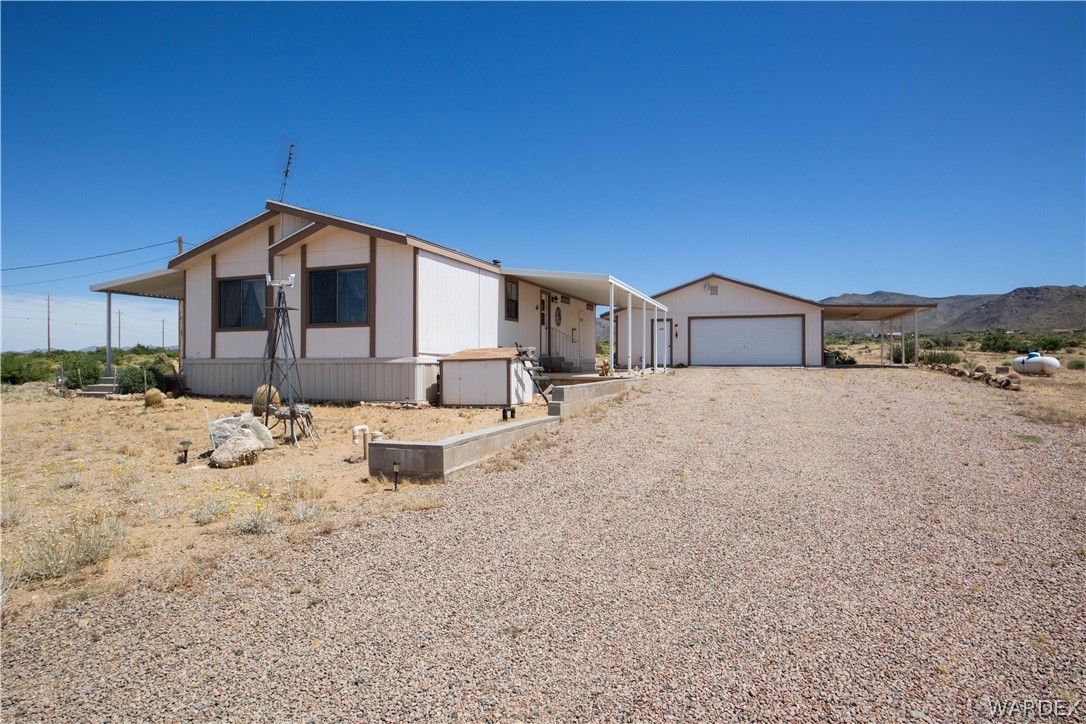 3920 Bacobi Road Golden Valley, AZ 86413 - Photo 1 of 31