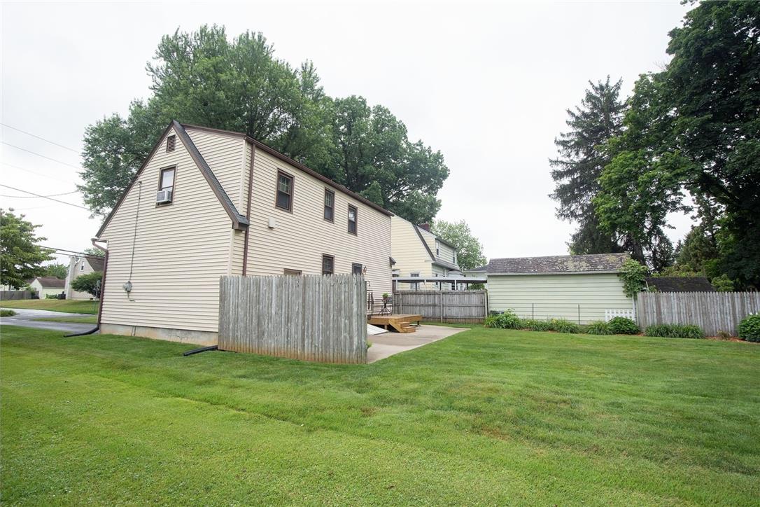 706 Stones Crossing Road Easton, PA 18045 - Photo 31 of 40 A partially fenced backyard offers both privacy and ample green space for outdoor activities.