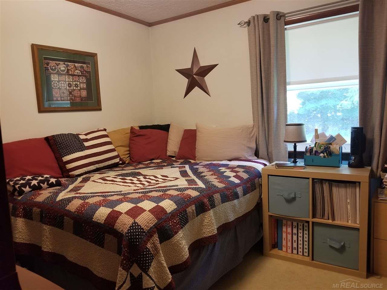 7123 County Farm Road Lexington, MI 48450 - Photo 26 of 46 This is a king sized bed!