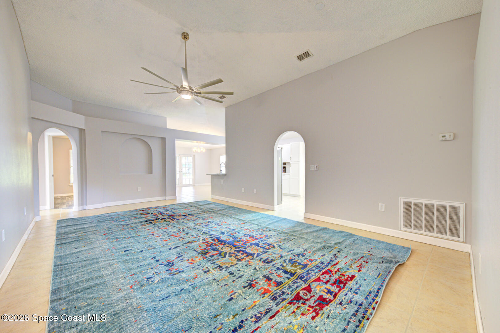 3353 Echo Ridge Place Cocoa, FL 32926 - Photo 24 of 51 living room with arched doorways