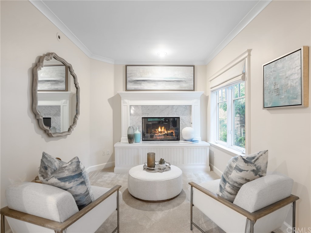 3 Stickley Drive Laguna Beach, CA 92651 - Photo 11 of 39 a living room with furniture and a fireplace