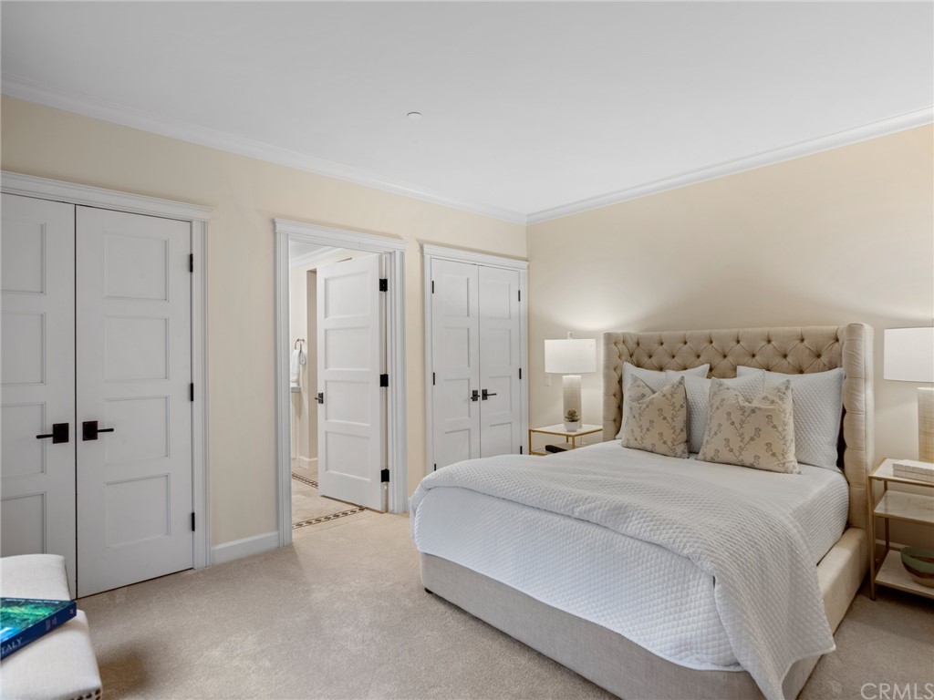 3 Stickley Drive Laguna Beach, CA 92651 - Photo 18 of 39 a spacious bedroom with a bed and a view of bathroom