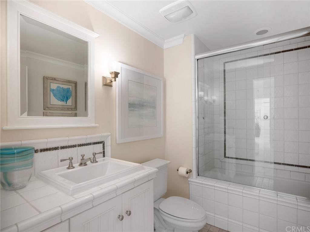 3 Stickley Drive Laguna Beach, CA 92651 - Photo 20 of 39 a bathroom with a sink a toilet and shower