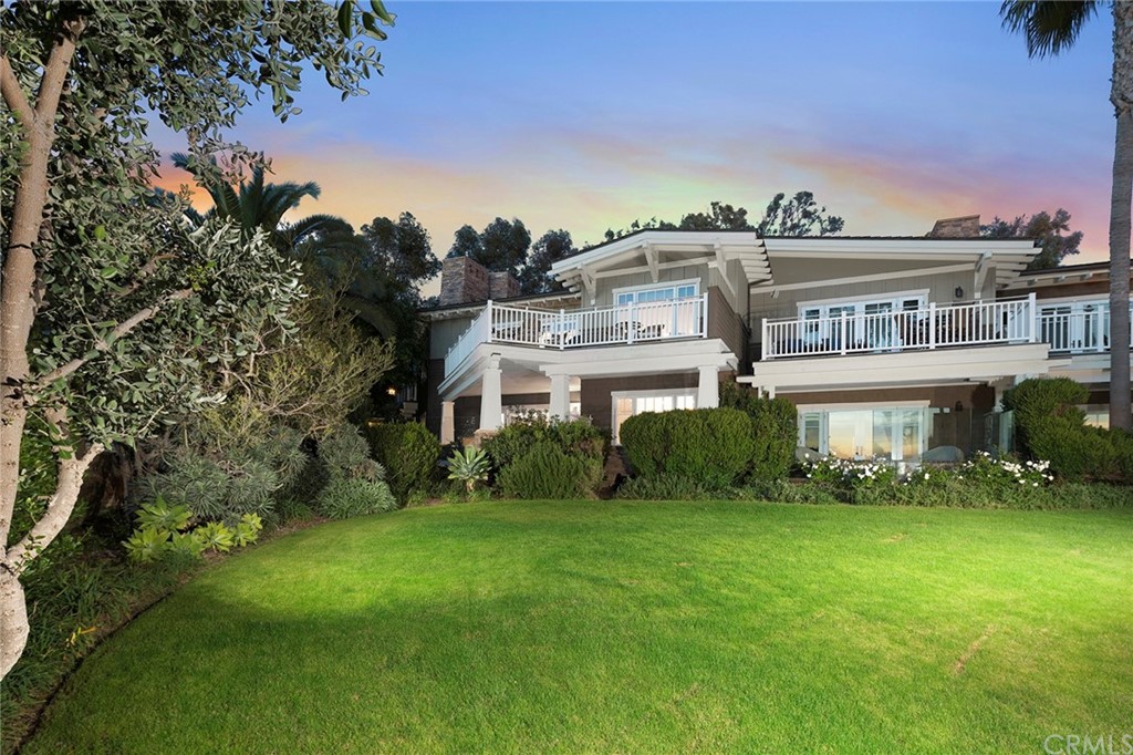 3 Stickley Drive Laguna Beach, CA 92651 - Photo 2 of 39 a front view of a house with a yard