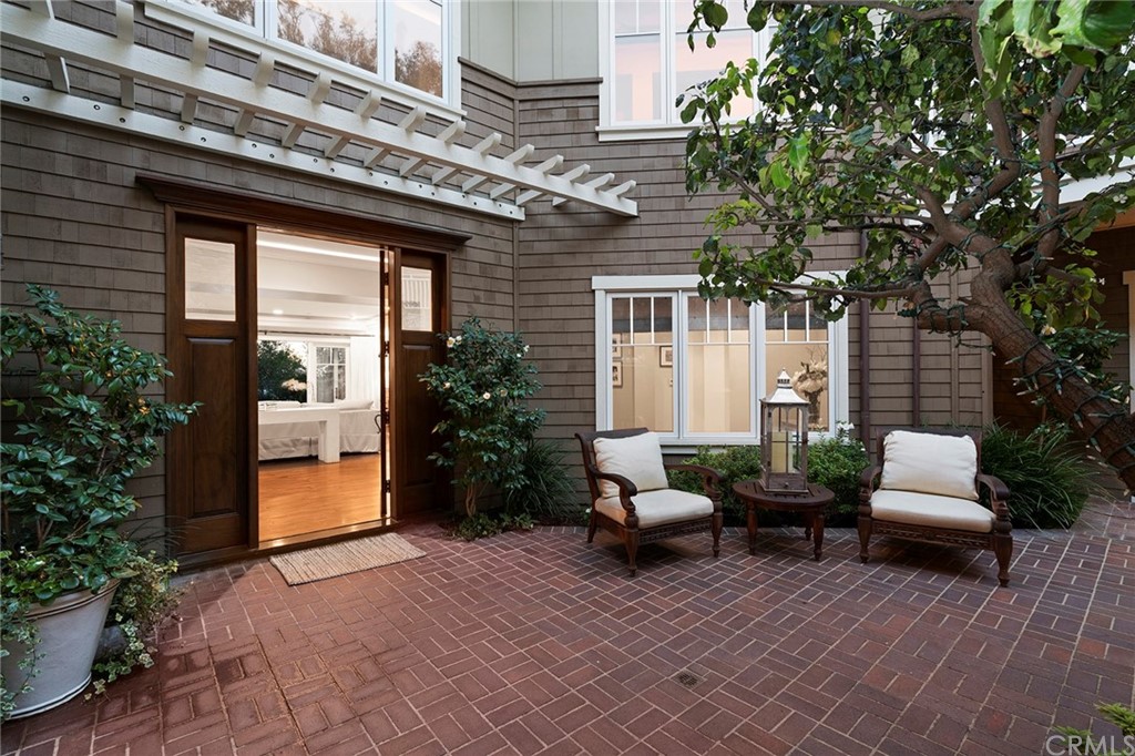 3 Stickley Drive Laguna Beach, CA 92651 - Photo 28 of 39 a view of a patio with couches and potted plants