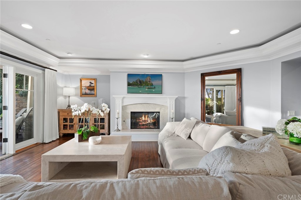 3 Stickley Drive Laguna Beach, CA 92651 - Photo 5 of 39 a living room with furniture fireplace and a large window