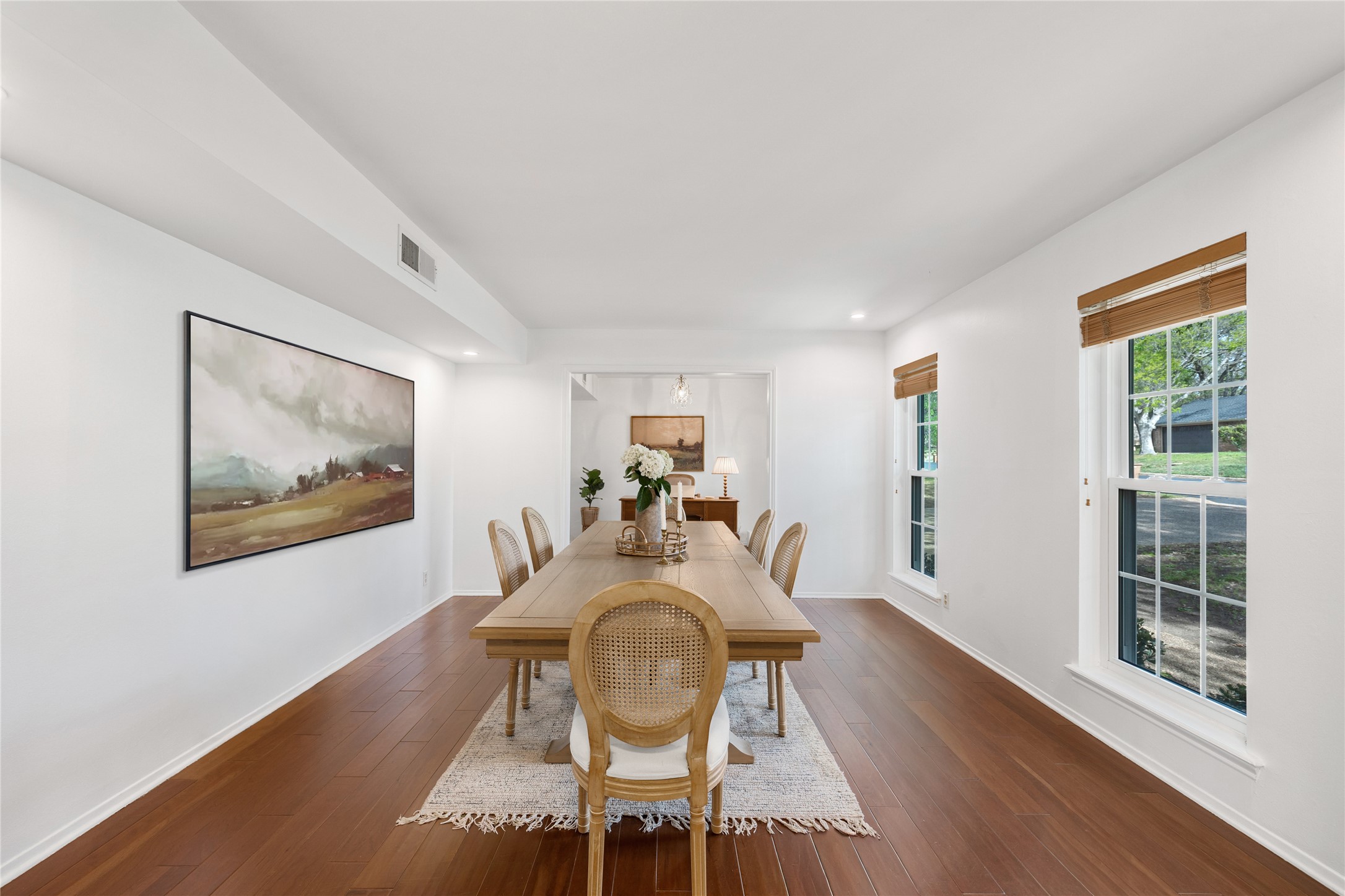 2403 Comburg Castle Way Austin, TX 78748 - Photo 11 of 40 Dining area featuring dark wood-type flooring