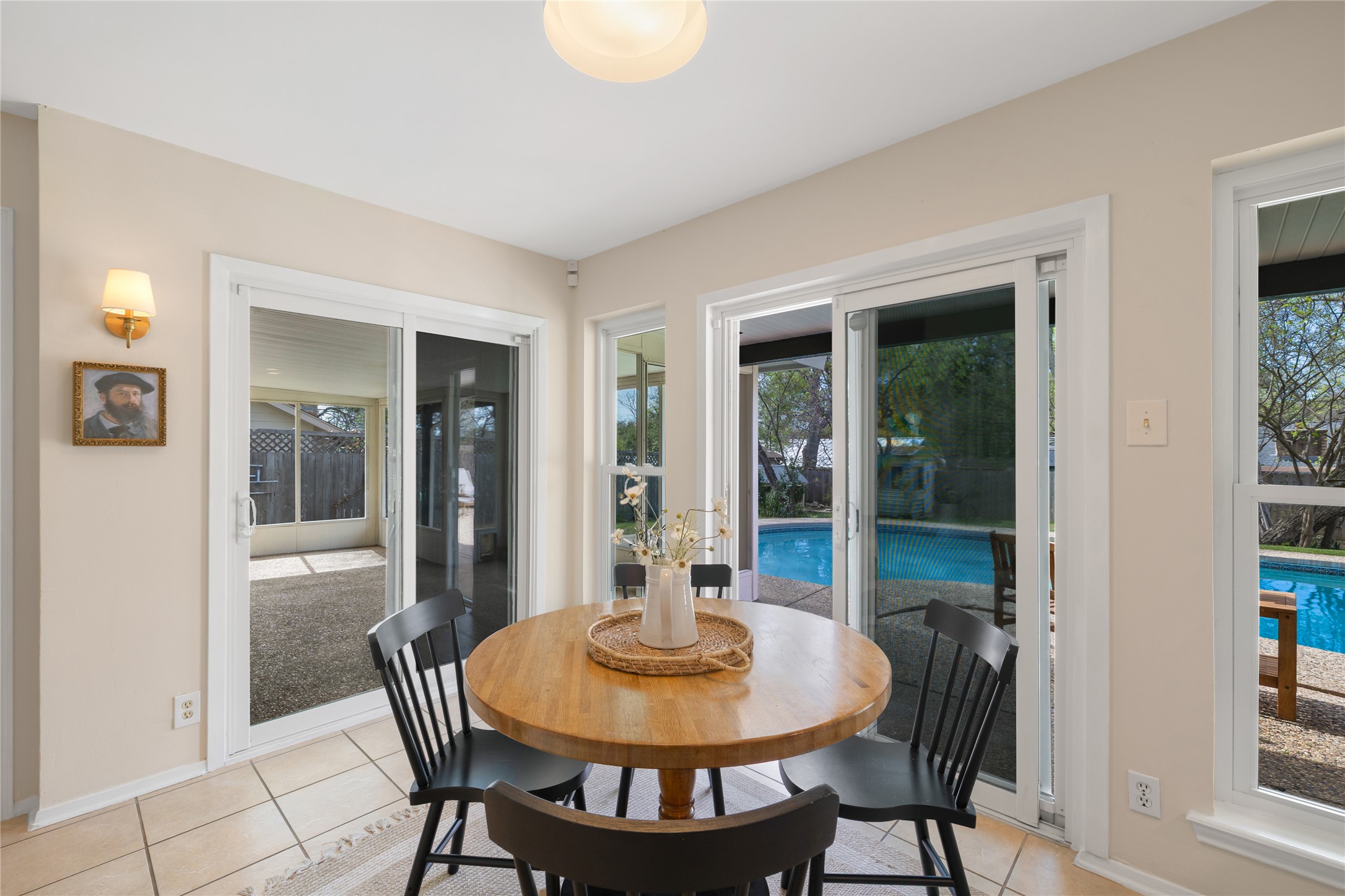 2403 Comburg Castle Way Austin, TX 78748 - Photo 14 of 40 Dining room featuring light tile patterned floors and baseboards