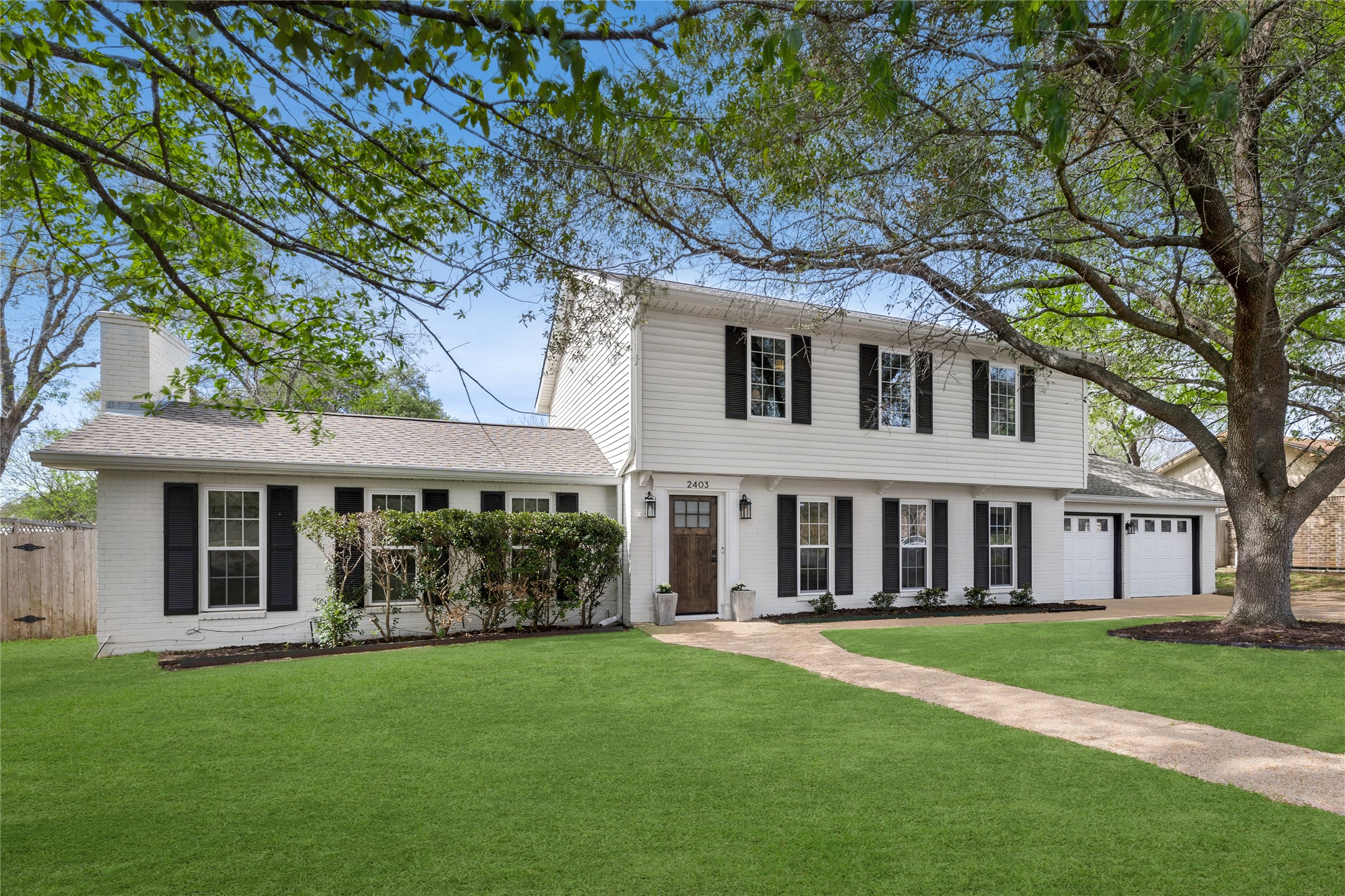 2403 Comburg Castle Way Austin, TX 78748 - Photo 16 of 40 Colonial inspired home with a front yard, a chimney, and brick siding