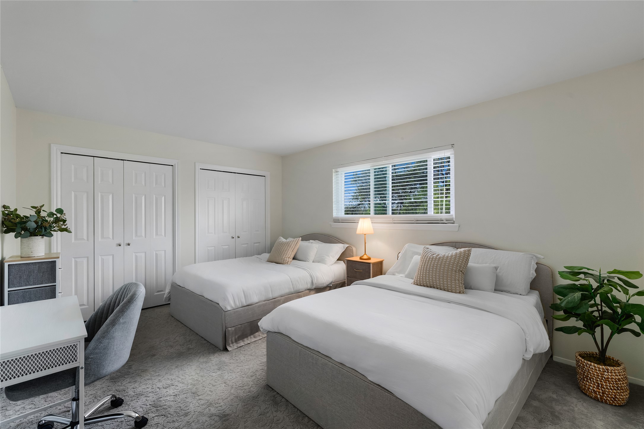 2403 Comburg Castle Way Austin, TX 78748 - Photo 27 of 40 Carpeted bedroom featuring multiple closets and an office area