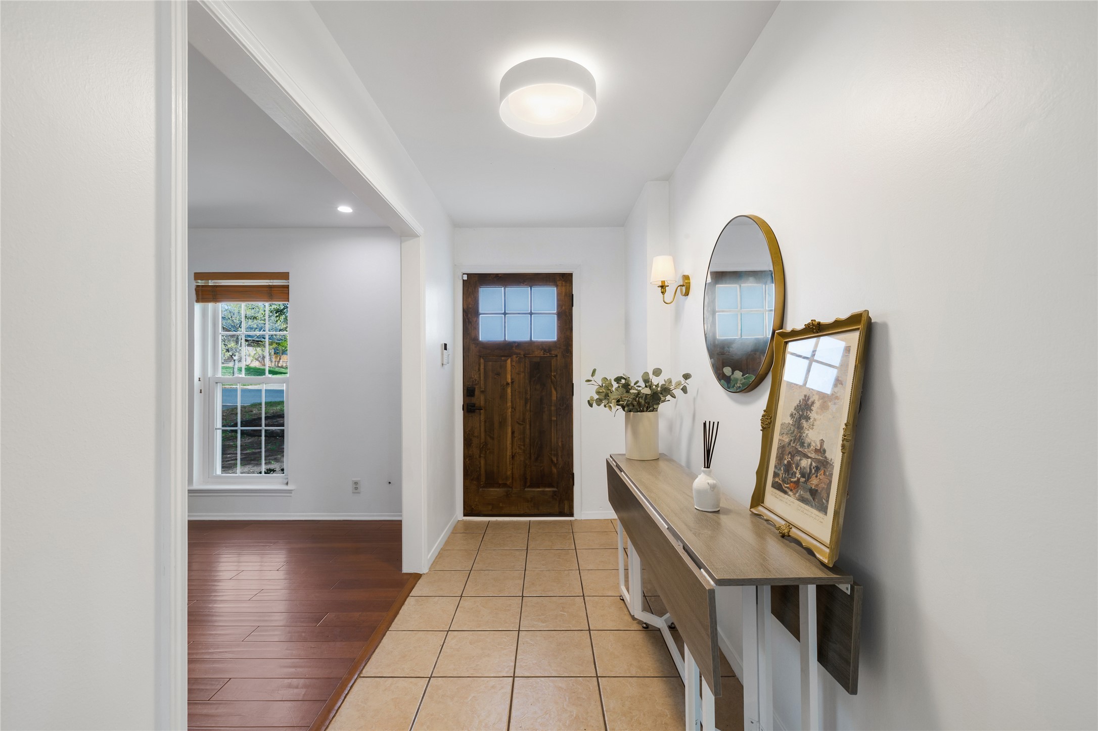 2403 Comburg Castle Way Austin, TX 78748 - Photo 7 of 40 Foyer entrance with light tile patterned flooring and recessed lighting