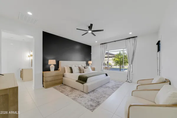 a bathroom with a shower and a sink