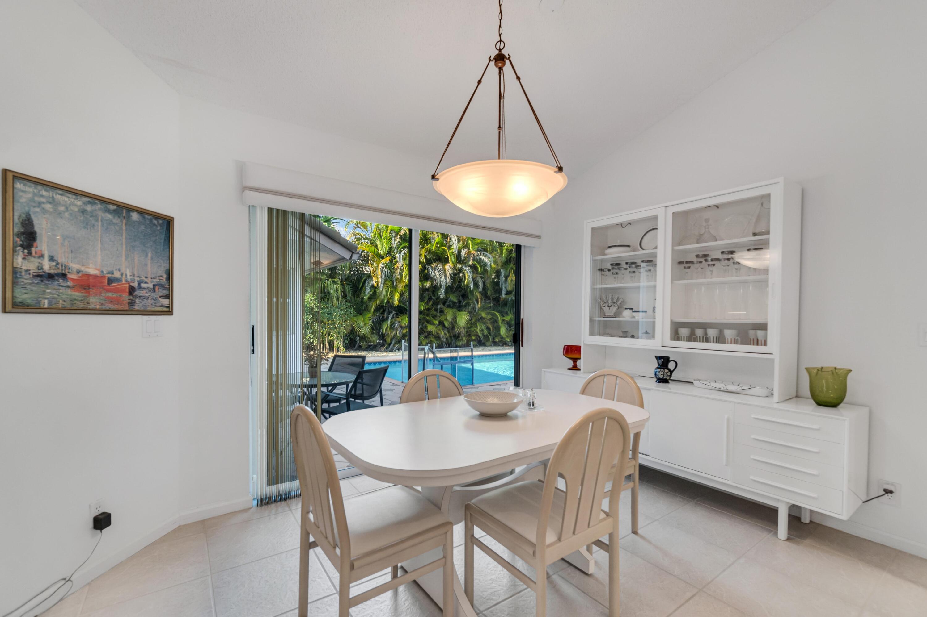7746 La Corniche Circle Boca Raton, FL 33433 - Photo 15 of 44 Poolside eating area!