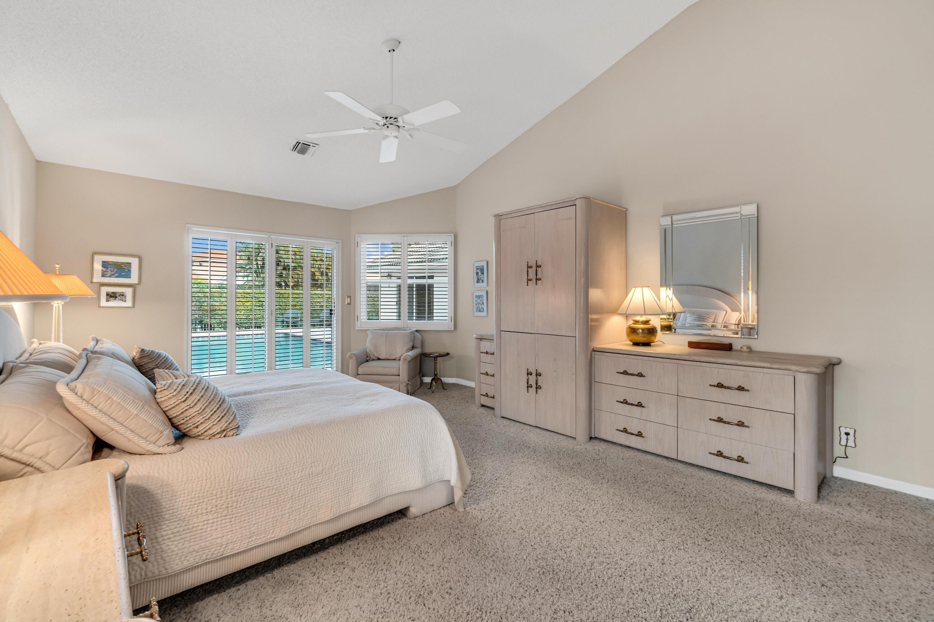 7746 La Corniche Circle Boca Raton, FL 33433 - Photo 17 of 44 Large Primary bed to pool!