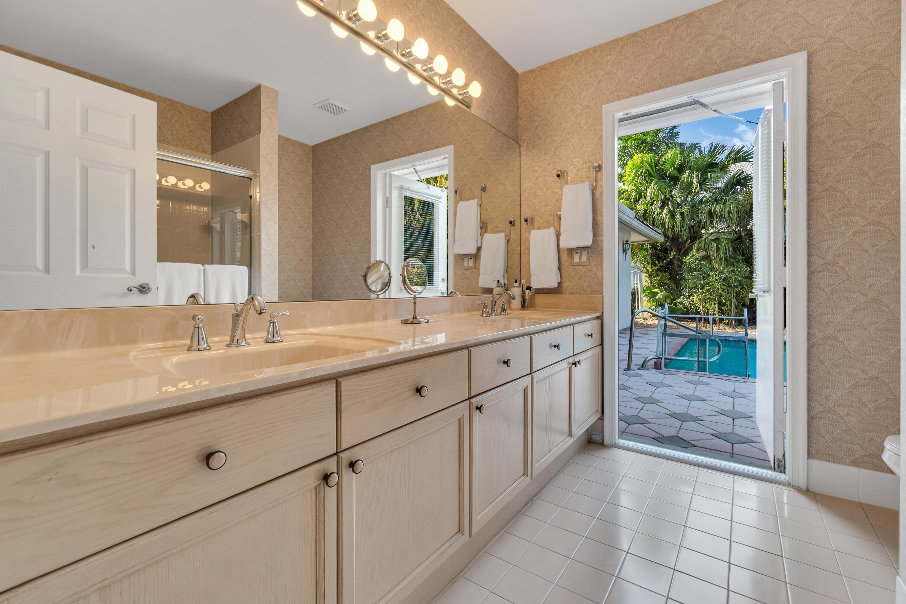 7746 La Corniche Circle Boca Raton, FL 33433 - Photo 26 of 44 Cabana bath to pool!