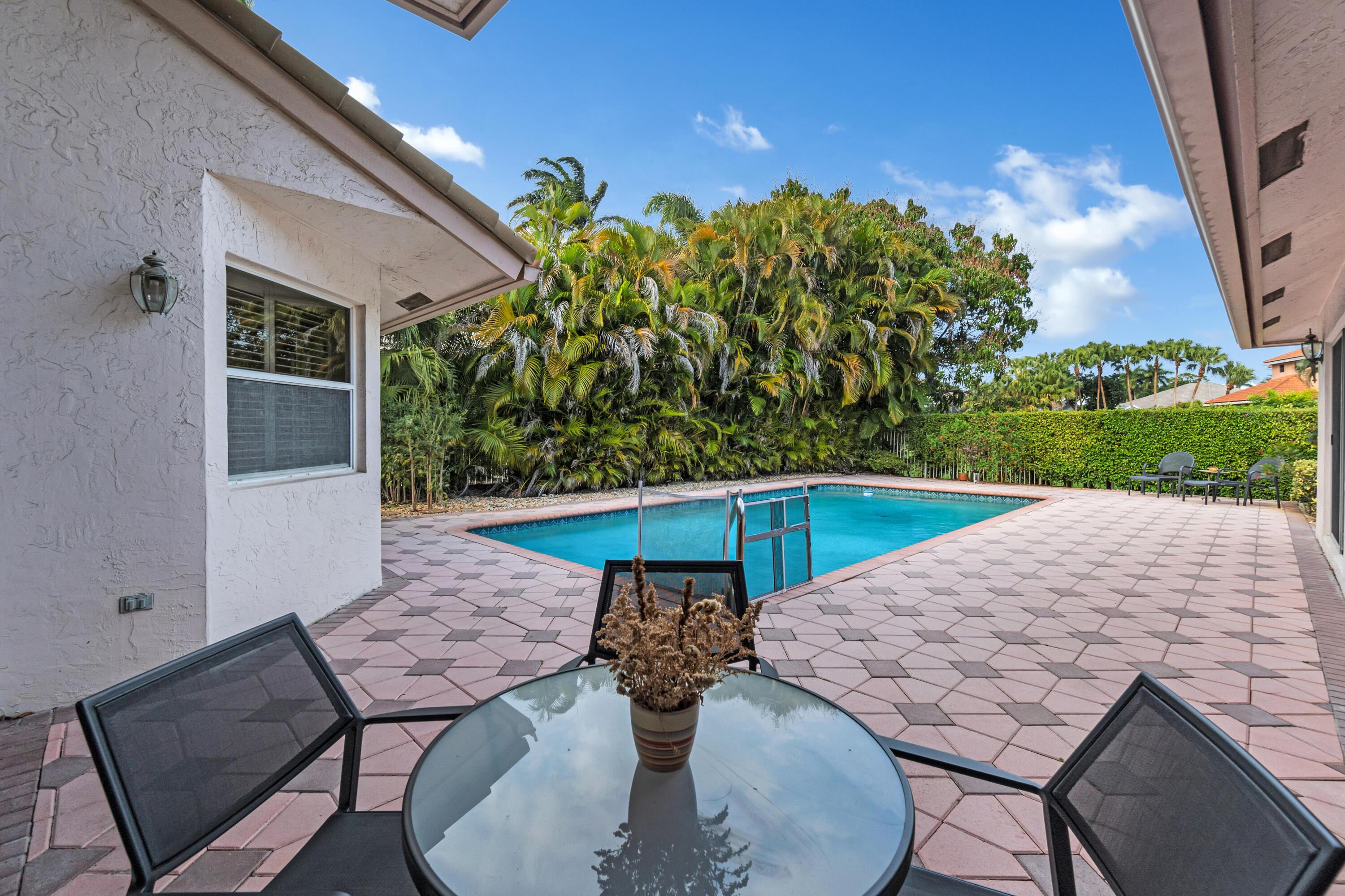 7746 La Corniche Circle Boca Raton, FL 33433 - Photo 30 of 44 Private pool & back!