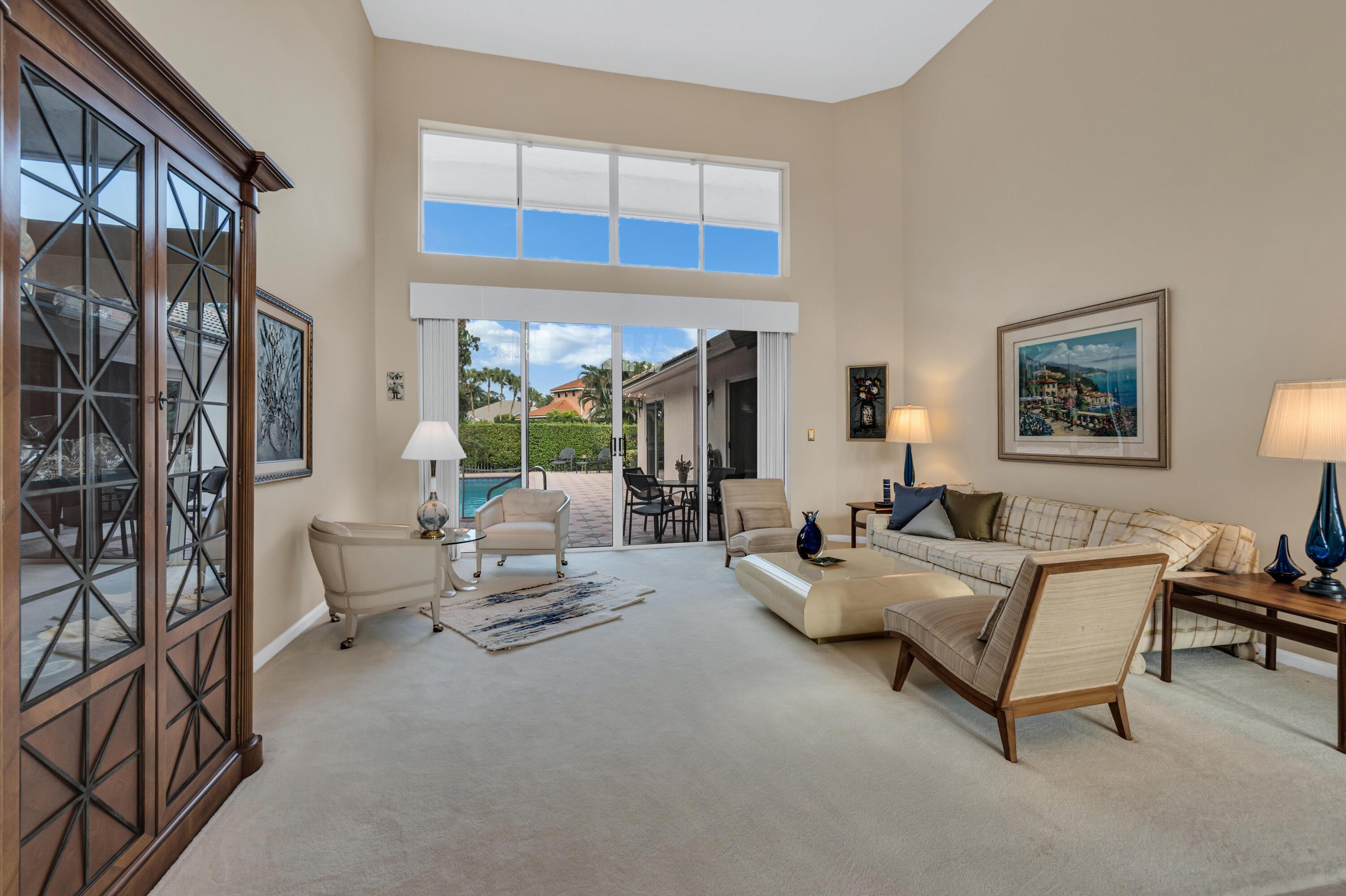 7746 La Corniche Circle Boca Raton, FL 33433 - Photo 8 of 44 Living overlooks pool!